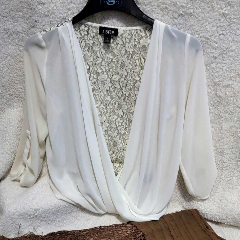 A.BYER cream sheer and black lace top. Size Small No stains.